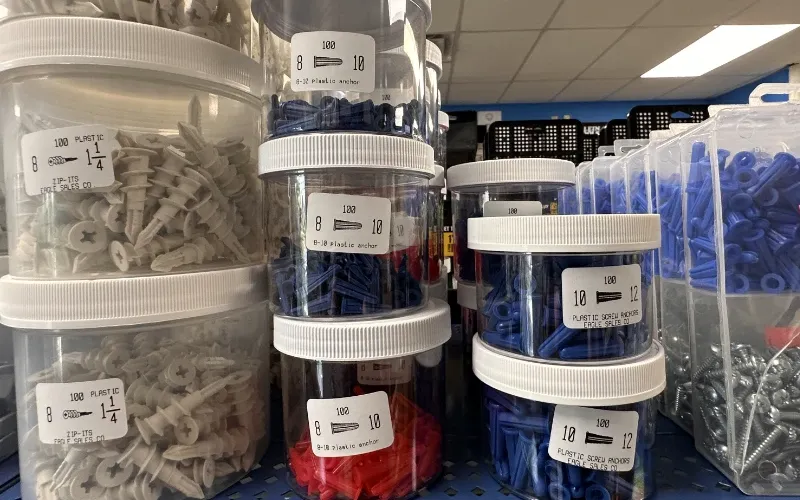 Plastic anchors in warehouse stock.